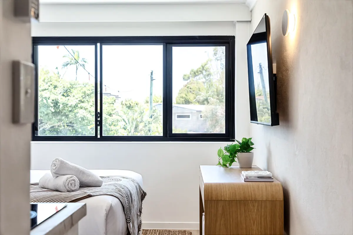 Living area with a desk and an outlook to the garden